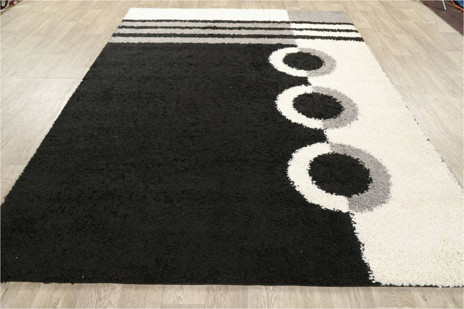 black modern shaggy oriental area rug 7x9
